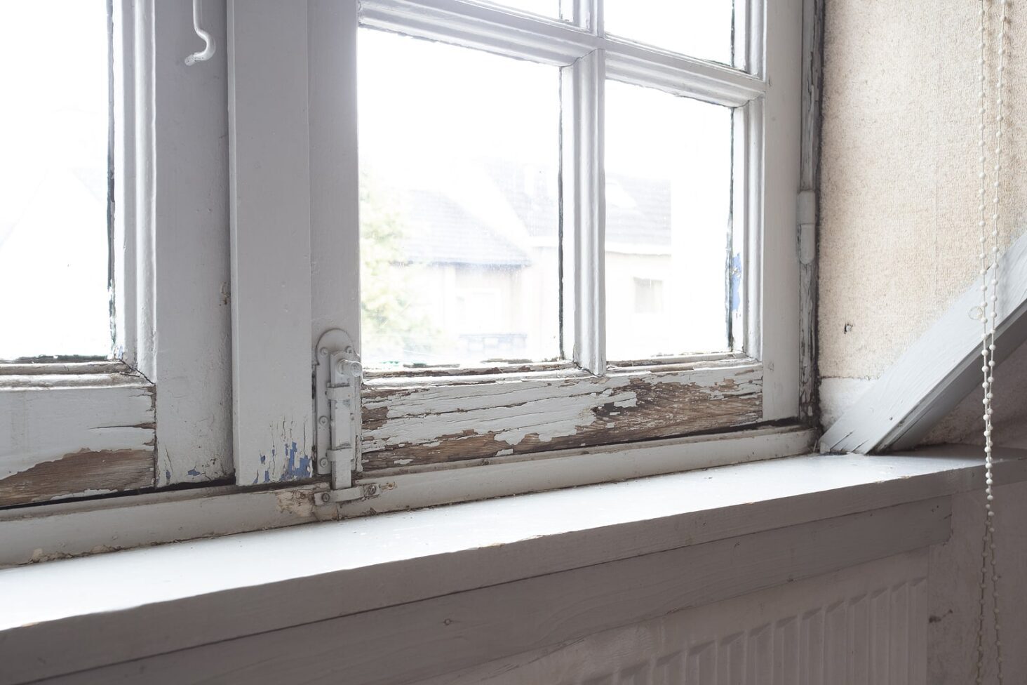Dry rot damage to a window of a house